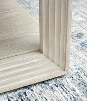 Ashley Furniture Marxhart end table with wooden top and black metal legs, modern design for living room decor.