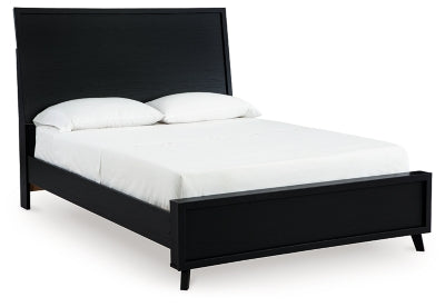 Ashley Furniture Danziar Bed with angled design, showcasing a modern bed frame with a sleek finish and sturdy construction.