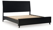 Ashley Furniture Danziar Bed with a sleek wooden frame and neutral finish, showcasing a modern bedroom setup.