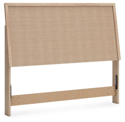 Ashley Furniture Cielden bed with elegant wooden frame, angled view showcasing its stylish design and craftsmanship.