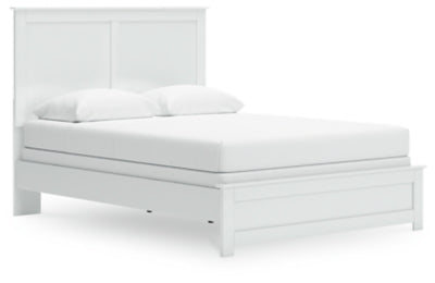 Ashley Furniture Bostwick Shoals bed with a dark wood finish and elegant headboard, shown from an angled view.