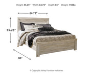 Ashley Furniture Bellaby Bed with a dark wood finish and classic design, shown in a cozy bedroom setting.