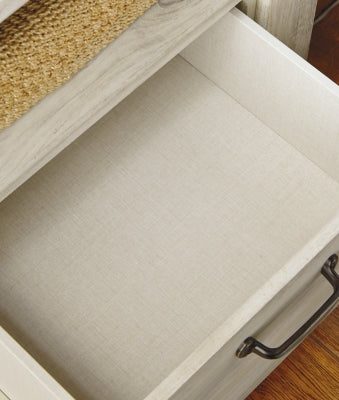 Ashley Furniture Bellaby nightstand with dark wood finish, featuring a single drawer and sleek modern design.