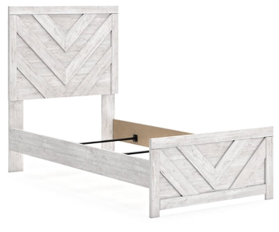 Ashley Furniture Cayboni Bed with a modern wooden frame, showcasing a sleek headboard and neutral finish from a side angle.