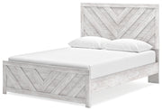 Ashley Furniture Cayboni Bed in a stylish design, shown from a side angle highlighting the headboard and frame.