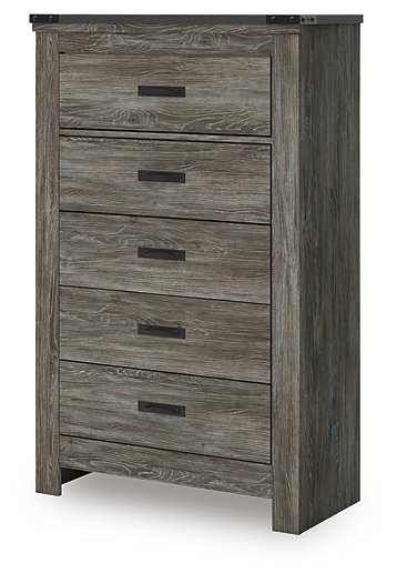 Ashley Furniture Frandern chest of drawers showing angled view of wood finish and multiple storage drawers.