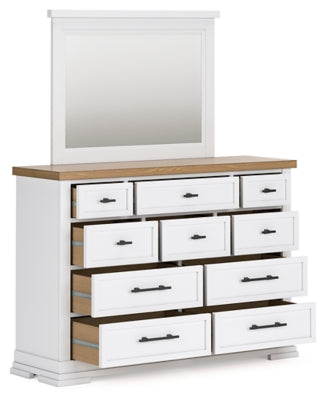 Ashley Furniture Ashbryn bedroom set with open view of bed frame and matching furniture pieces in a stylish bedroom display.