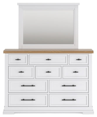 Ashley Furniture Ashbryn bedroom set with a headboard, dresser, and nightstand arranged in a modern bedroom scene.