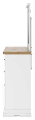 Ashley Furniture Ashbryn bedroom set with a bed, nightstands, and dresser in a modern bedroom interior.