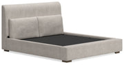 Ashley Furniture Cabalynn upholstered bed with a plush headboard and elegant design, shown from an angled perspective.