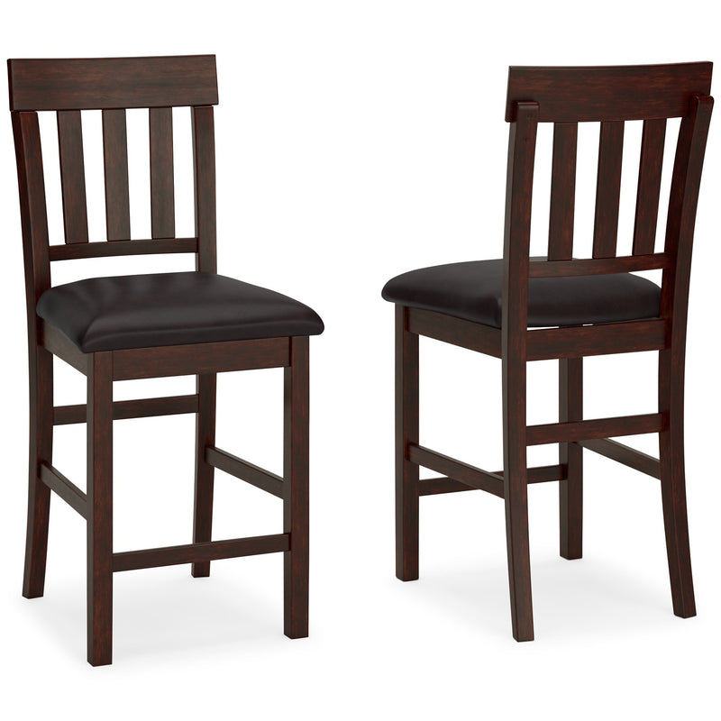 Ashley Furniture Haddigan counter height bar stool with wooden legs and cushioned seat in green fabric.