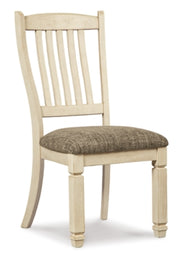 Ashley Furniture Bolanburg dining room set with a table and six upholstered chairs, shown in a modern dining space.