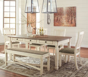 Ashley Furniture Bolanburg dining room set with a wooden table and matching chairs, showcasing a classic dining space design.