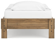 Ashley Furniture Deanlow Bed with a sleek headboard and modern design, shown from the back view.