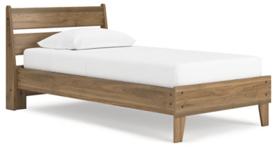 Ashley Furniture Deanlow Bed with a modern wooden frame and angled headboard, shown from a side angle.
