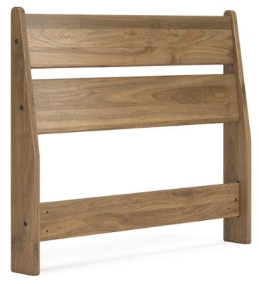 Ashley Furniture Deanlow Bed with a sleek wooden frame and angled headboard, shown from a side angle.