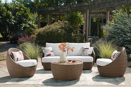 Outdoor seating set with double point design by Ashley Furniture, featuring cushioned chairs and a matching table for patio relaxation.