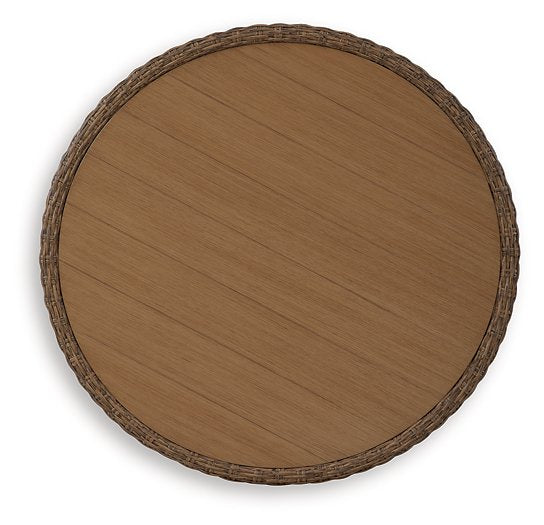 Outdoor seating set by Ashley Furniture featuring double-point design with cushioned chairs and a central table for outdoor relaxation.