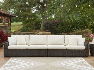 Ashley Furniture Kimora outdoor sectional with cushioned seating and stylish design for outdoor patio lounging.