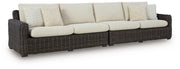 Ashley Furniture Kimora outdoor sectional with weather-resistant cushions and stylish wicker frame, perfect for patio seating.