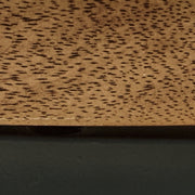 Ashley Furniture Noraluna coffee table with a sleek finish, modern cocktail table design, perfect for living room decor.