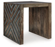 Ashley Furniture Dreggan End Table with angled wood design and warm finish, shown from a side angle.