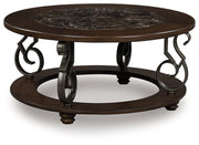 Ashley Furniture Frallyn cocktail coffee table with a modern wooden finish, shown from an angled side view.