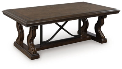 Ashley Furniture Maylee coffee table with a modern cocktail design, featuring a sleek surface and stylish wooden legs.