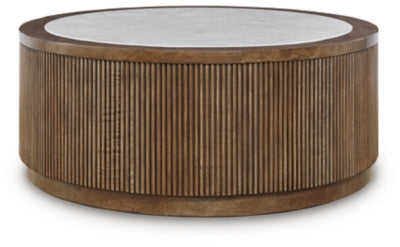 Ashley Furniture Hadonna coffee table with a sleek cocktail design and dark wood finish, featuring a spacious tabletop.