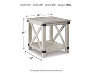 Ashley Furniture Carynhurst end table with a dark wood finish, featuring a classic design and smooth top surface.