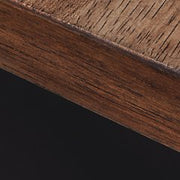 Wildenauer 76-inch TV stand by Ashley Furniture in a dark wood finish, featuring open shelves and storage cabinets for media devices.
